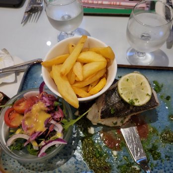 Flesk Restaurant - Pan fried hake with a tomato and pesto.   Also side salad and chips. - Seafood Near Me - Killarney, Kentucky