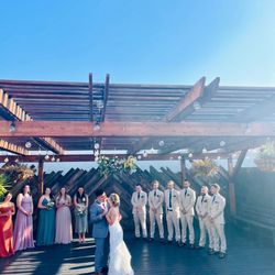 DJ Dave Muzik Man - Bride and groom share first dance and bridal party stand behind them