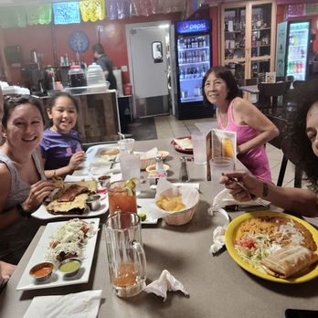 La Oaxaqueña - Molotes, tyluda, kids burrito, fajita burrito, and chimichanga. Also, a michelada which is in front of their chapulines. - Tacos Near Me - St. Louis, Missouri La Oaxaqueña - Molotes, tyluda, kids burrito, fajita burrito, and chimichanga. Also, a michelada which is in front of their chapulines. - Tacos Near Me - St. Louis, Missouri