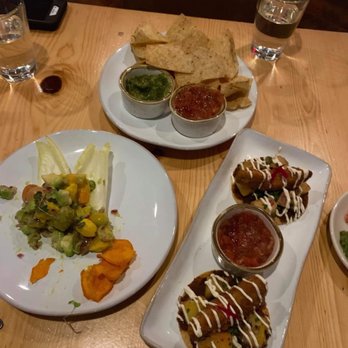 La Sirena - For appetizers, we had the chips and salsa (top), the saffron ceviche (left) and the avocado tostada (right). All three were excellent. - Cocktail Bars Near Me - Lubbock, Texas
