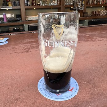 McNally's Irish Pub - Guinness tap beer in a mug - Irish Pub Near Me - Sioux Falls, South Dakota McNally's Irish Pub - Guinness tap beer in a mug - Irish Pub Near Me - Sioux Falls, South Dakota