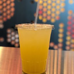 a drink in a plastic cup with a straw a drink in a plastic cup with a straw