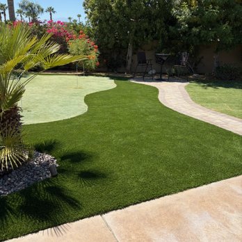 El's Landscape - Astro turf around putting green and paver walkway to bistro table setting. - Landscaping Near Me