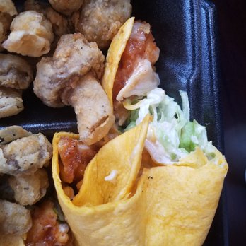 Slim Chickens - "Wrap" didn't describe this well...it was falling apart and looked like it was ripped in two, not cut. - Chicken Wings Near Me - Plainfield, Illinois