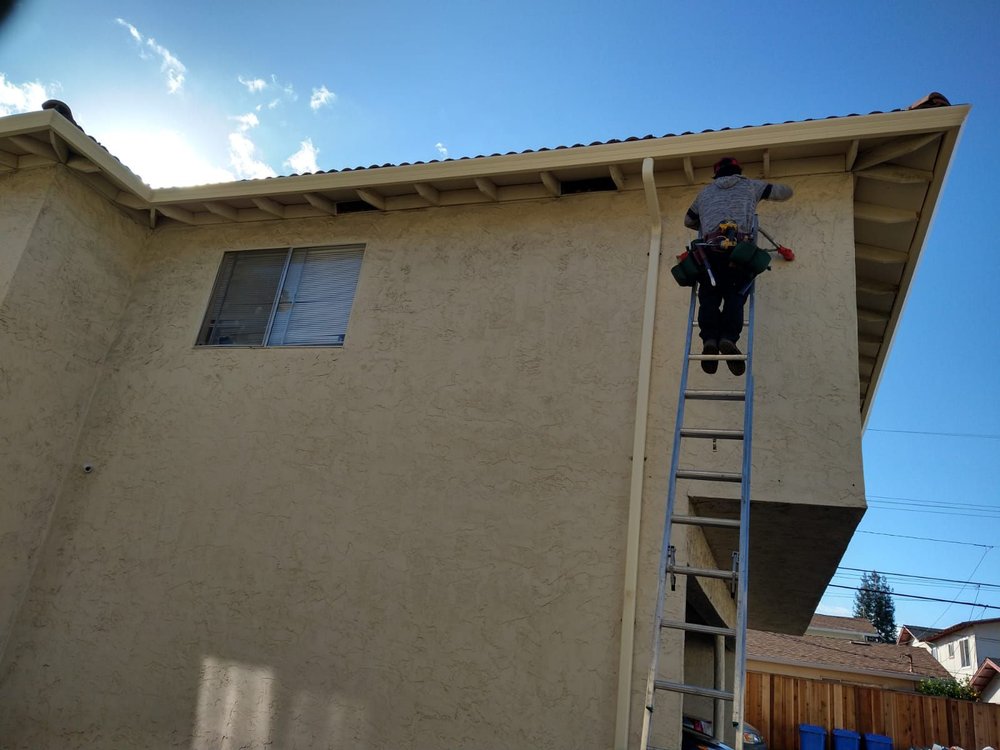 Slide of JB Rain Gutter installation