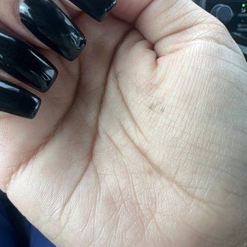Bella Nails & Spa - nail & black polish on my hand :/ - Nail Salons Near Me - Upland, California