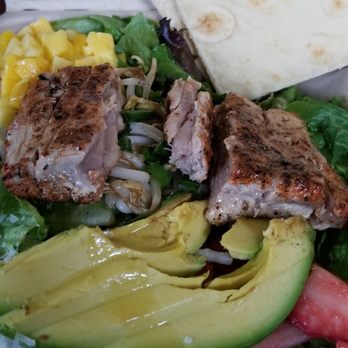 Aloha Salads - Ono island ahi with salad on top and bite taken of ahi. - Salad Near Me - Aiea, Hawaii