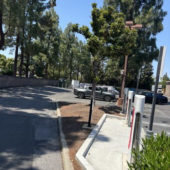 Tesla Supercharger - A few more chargers at one end - EV Charging Stations Near Me - Mountain View, California Tesla Supercharger - A few more chargers at one end - EV Charging Stations Near Me - Mountain View, California