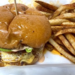 Clásica Burger with a side of fries