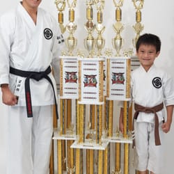 Kai Leung's Shotojuku Karate Dojo - Sensei James Luk with student Aidan Lok who took six first place finishes at the 2013 ISKA US Open.