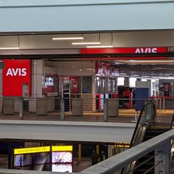 Avis Rent A Car - AVIS counter. I believe that girl by the counter was the same one who assisted me when I first arrived