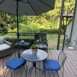Composite deck and metal and cable railings