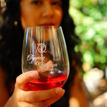 Topping & Legnon Wines - a woman holding a glass of wine - Wine Tasting Room Near Me - Santa Rosa, California Topping & Legnon Wines - a woman holding a glass of wine - Wine Tasting Room Near Me - Santa Rosa, California