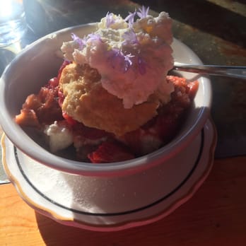 Hell's Backbone Grill & Farm - Strawberry Rhubarb Shortcake with "dreamy" whipped cream and edible flowers. - American Near Me - Boulder, Utah Hell's Backbone Grill & Farm - Strawberry Rhubarb Shortcake with "dreamy" whipped cream and edible flowers. - American Near Me - Boulder, Utah