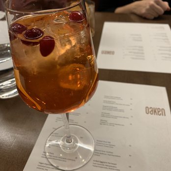 Oaken Bistro Bar - "Christmas Spirits" seasonal drink. Aperol, Elderflower Liqueur, Rosemary Simple Syrup, Prosecco. - New American Near Me - Lake Forest, Illinois