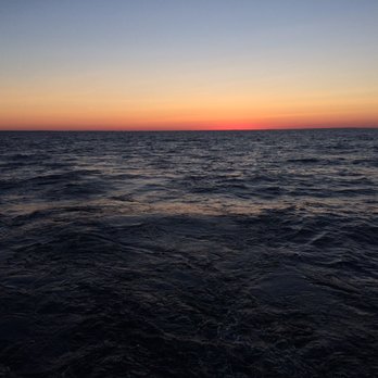 Lobster Roll Cruises - the sun setting over the ocean - Tours Near Me - East Dennis, Massachusetts Lobster Roll Cruises - the sun setting over the ocean - Tours Near Me - East Dennis, Massachusetts