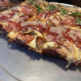 Half and half Detroit style pizza