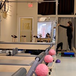 To Be Pilates - Small group class in the back of the studio.