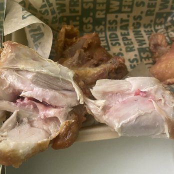 Wingstop - Raw chicken still bloody in the center - Chicken Wings Near Me - Corona, California