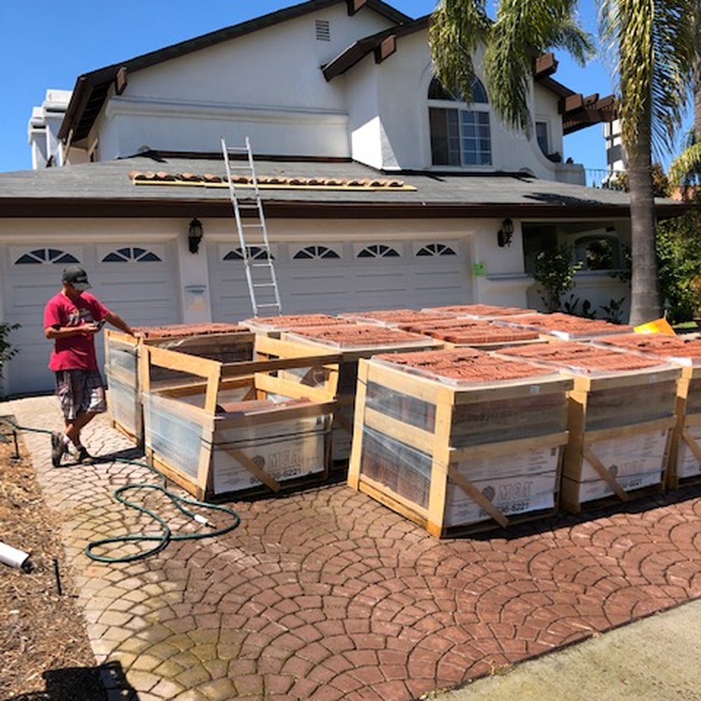 Top Quality Roofing - Shane inspects tiles. - Roofing Near Me - San Clemente, California Top Quality Roofing - Shane inspects tiles. - Roofing Near Me - San Clemente, California