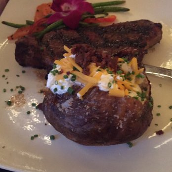 Bastien's - Sugar steak loaded baked potato - Steakhouses Near Me - Denver, Colorado Bastien's - Sugar steak loaded baked potato - Steakhouses Near Me - Denver, Colorado