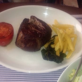 Flanigan - Grilled fillet steak with spinach and fries and grilled tomatoe - Mediterranean Near Me - Puerto Portals, PM Flanigan - Grilled fillet steak with spinach and fries and grilled tomatoe - Mediterranean Near Me - Puerto Portals, PM