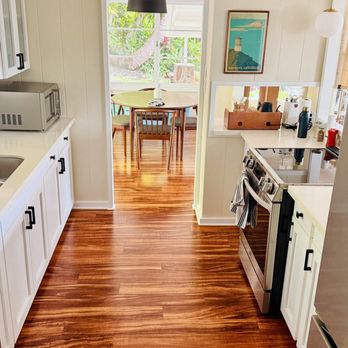 Oahu Fresh Clean - Mānoa deep cleaning -- kitchen after service, with sink, counters, appliance exteriors, and floors cleaned. - Home Cleaning Near Me Oahu Fresh Clean - Mānoa deep cleaning -- kitchen after service, with sink, counters, appliance exteriors, and floors cleaned. - Home Cleaning Near Me