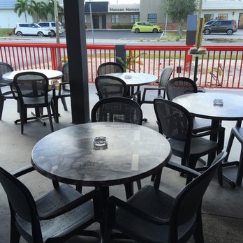Paddywagon Irish Pub - tables and chairs outside - Irish Pub Near Me - Cape Coral, Florida Paddywagon Irish Pub - tables and chairs outside - Irish Pub Near Me - Cape Coral, Florida