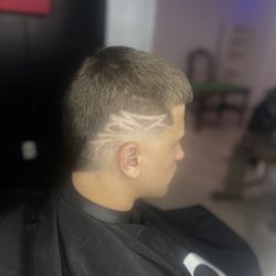 The Cleveland Barbershop - Burst face with design