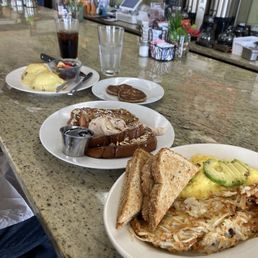Eggs Benedict, horchata French toast (half order, side of sausage, build your own omelette with hash browns and toast Eggs Benedict, horchata French toast (half order, side of sausage, build your own omelette with hash browns and toast