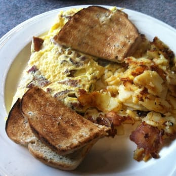 Huxley's Bookmark Cafe - Bacon and cheese omelet with home fries and toast - American Near Me - Meriden, Connecticut Huxley's Bookmark Cafe - Bacon and cheese omelet with home fries and toast - American Near Me - Meriden, Connecticut