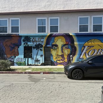 Marathon Burger - A mural of Kobe and Nipsey on the corner near the restaurant. - Burgers Near Me - Los Angeles, California