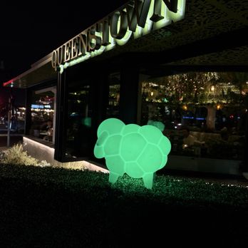 Queenstown Del Mar - Outside. Electric green sheep. Sounds like a Radiohead song or something. - Burgers Near Me - Del Mar, California Queenstown Del Mar - Outside. Electric green sheep. Sounds like a Radiohead song or something. - Burgers Near Me - Del Mar, California