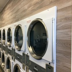 Spin Cycle Laundromats - Our brand new dryers.