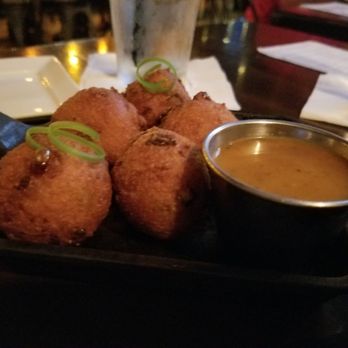 Bosscat Kitchen & Libations - These pulled pork hush puppies were phenomenal! Make sure to dip them in that Carolina Sauce. - New American Near Me - Houston, Texas