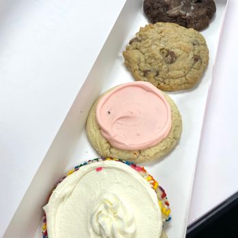 Crumbl - Schaumburg - Starting from the bottom: funfetti milkshake, sugar cookie, chocolate chip, brownie batter - Desserts Near Me - Schaumburg, Illinois