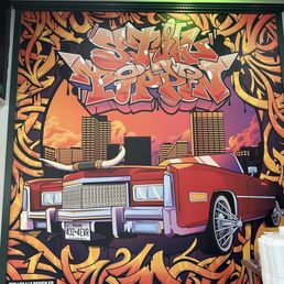 a mural of a red car a mural of a red car