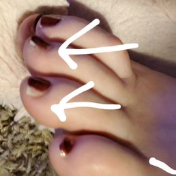 Half painted toes from my $45 deluxe pedi from Queen nails..RIP off