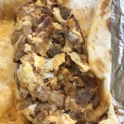 Boomer's Taqueria - Pastor n Egg on a flour tortilla.