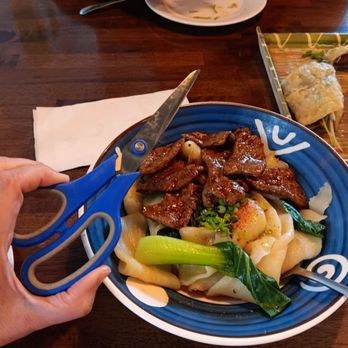 Chef Sun's Noodle And Dumpling - Biang Biang noodles with beef, comes with scissors to cut the noodles - Noodles Near Me - McKinney, Texas