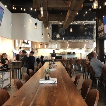 Amici 30A Italian Kitchen - Center of the dining room. There's plenty of outdoor and indoor seating, open air concept, breezy and cool - Italian Near Me - Inlet Beach, Florida