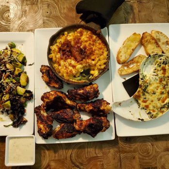 Buckeye Bourbon House - Brussel sprouts topped with bacon and cheese. macaroni and cheese, The house rub chicken wings and spinach and artichoke dip. - Cocktail Bars Near Me - Columbus, Ohio Buckeye Bourbon House - Brussel sprouts topped with bacon and cheese. macaroni and cheese, The house rub chicken wings and spinach and artichoke dip. - Cocktail Bars Near Me - Columbus, Ohio