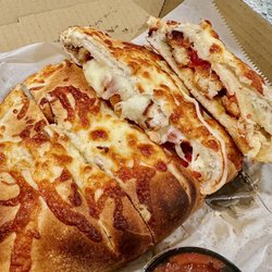 Wise Guys Deli Woonscoket - Stuffed Chicken Parm Calzone
