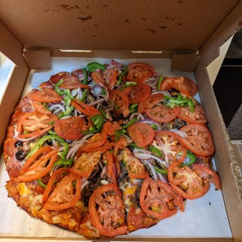 The Megabite - The amazing pizza I ordered all dazzled up with some tomatoes - Pizza Near Me - Vancouver, Washington The Megabite - The amazing pizza I ordered all dazzled up with some tomatoes - Pizza Near Me - Vancouver, Washington