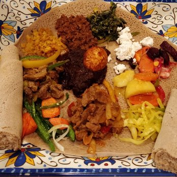 Mesob Ethiopian Restaurant - Meat and Veggie sampler (Good for 3-4 people) - Ethiopian Near Me - Minneapolis, Minnesota Mesob Ethiopian Restaurant - Meat and Veggie sampler (Good for 3-4 people) - Ethiopian Near Me - Minneapolis, Minnesota