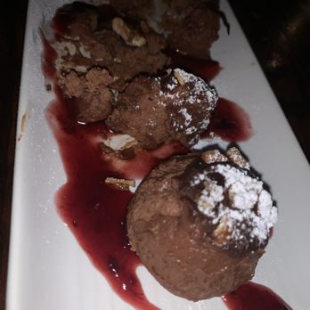 Santiago's Bodega - Their special; a chocolate truffle cheesecake with strawberry sauce - Tapas Bars Near Me - Key West, Florida Santiago's Bodega - Their special; a chocolate truffle cheesecake with strawberry sauce - Tapas Bars Near Me - Key West, Florida
