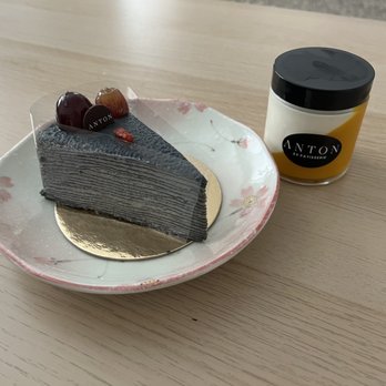 Anton - Slice of black sesame Mille crepe and mango panna cotta - Bakeries Near Me - San Jose, California Anton - Slice of black sesame Mille crepe and mango panna cotta - Bakeries Near Me - San Jose, California