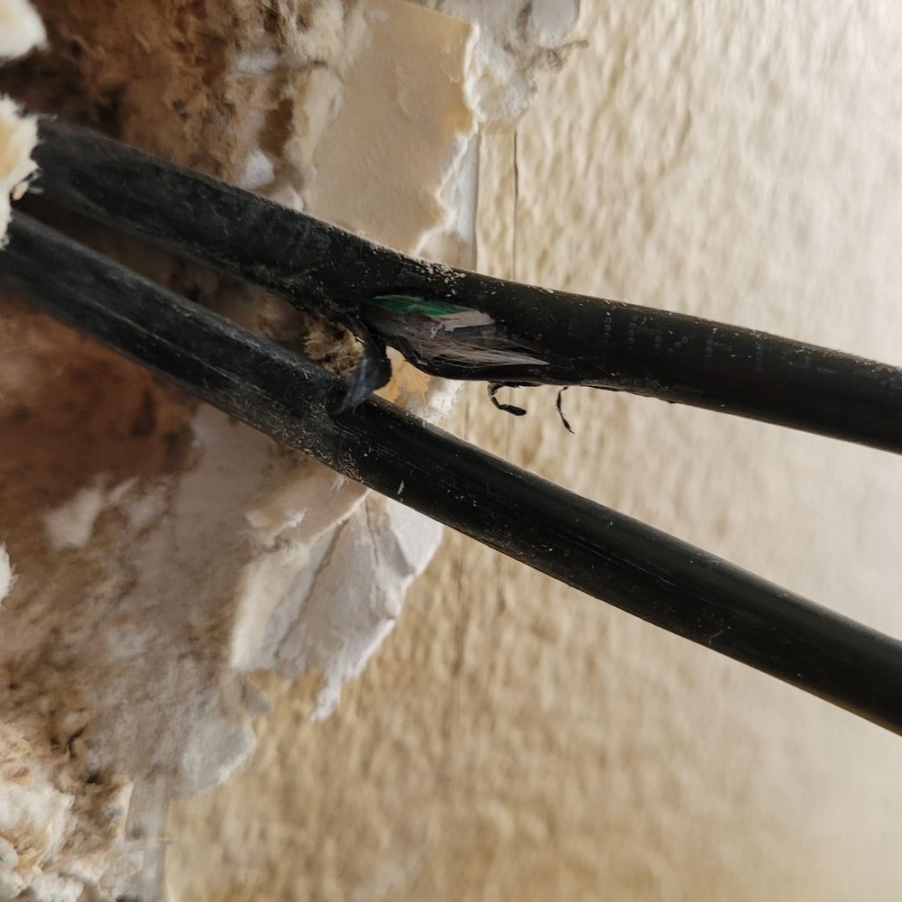 Espinoza Installations - Damaged cable which would likely fail testing. This section of cable would be outside in the elements. - Security Systems Near Me - Los Angeles, California Espinoza Installations - Damaged cable which would likely fail testing. This section of cable would be outside in the elements. - Security Systems Near Me - Los Angeles, California