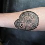 Photo of Voluta Tattoo