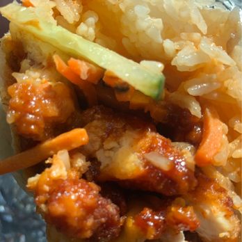 Just Wok 'N Around - Tornado Burrito.  [Spicy Korean chicken, rice, cucumber, pickled carrot & daikon radish, wok sauce in a flour tortilla.] Great portion size. - Food Trucks Near Me - Prineville, Oregon